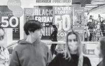  ?? Karsten Moran / New York Times ?? Black Friday shoppers take in the bargains Friday at Westfield Garden State Plaza, a shopping mall in Paramus, N.J.