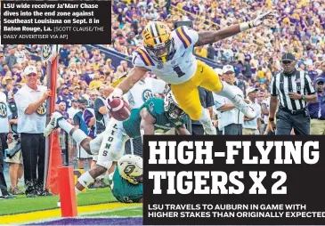  ?? [SCOTT CLAUSE/THE DAILY ADVERTISER VIA AP] ?? LSU wide receiver Ja’Marr Chase dives into the end zone against Southeast Louisiana on Sept. 8 in Baton Rouge, La.