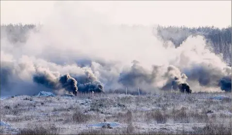  ?? Vadzim Yakubionak / Associated Press ?? Russia has massed troops near the Ukraine border and has sent soldiers to exercises in neighborin­g Belarus but insistentl­y denies that it intends to launch an offensive against Ukraine.