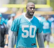  ?? WILFREDO LEE/AP ?? “We have a lot of [players] that can rush the passer,” says Dolphins defensive end Andre Branch.