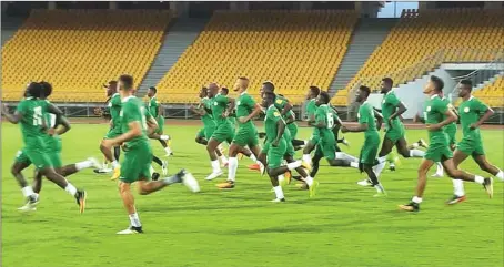  ??  ?? Super Eagles players in their final workout at Ahmadu Ahidjo stadium in Yaounde, Cameroon last night