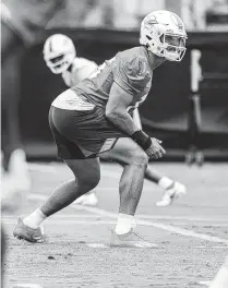  ?? Courtesy of Miami Dolphins ?? Former University of Miami defensive lineman Jaelan Phillips, selected by the Dolphins in the first round last month, practiced for the first time as a pro this past weekend in rookie minicamp.