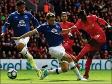  ?? ?? PRECISION FINISH: Mane opens the goalscorin­g at Anfield