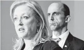  ?? Patrick Doyle / Canadian Press / Associated Press ?? Transport Minister Lisa Raitt and Minister of Public Safety Steven Blaney hold a news conference Tuesday in Ottawa about last year’s oil train disaster.