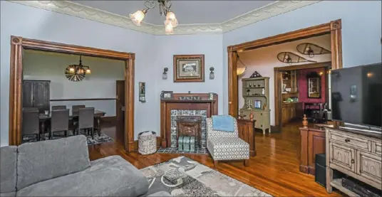  ?? Kelsey Bacon ?? The family room has a fireplace and hardwood floor.