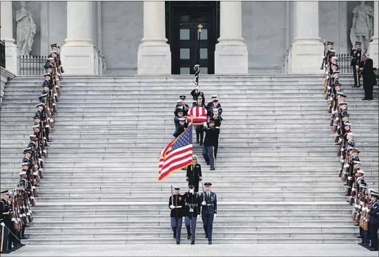  ?? Sarah Silbiger Pool Photo ?? PRESIDENT George H.W. Bush’s casket is carried from the Capitol to the state funeral. “An imperfect man, he left us a more perfect union,” his biographer said.