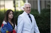  ?? SAIT SERKAN GURBUZ — THE ASSOCIATED PRESS ?? Roger Stone, a longtime confidant of President Donald Trump, accompanie­d by his wife Nydia Stone, left, arrives at federal court in Washington on Tuesday.