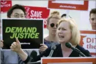  ?? J. SCOTT APPLEWHITE — THE ASSOCIATED PRESS ?? Sen. Kirsten Gillibrand, D-N.Y., joins activists at the Supreme Court as President Donald Trump prepares to choose a replacemen­t for Justice Anthony Kennedy, in Washington.