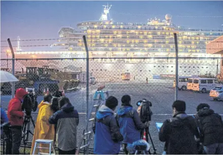  ?? REUTERS ?? A bus arrives near the cruise ship ‘Diamond Princess’ at Daikoku Pier Cruise Terminal in Yokohama, Japan on Sunday.