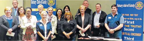  ?? Picture: SUPPLIED ?? WELCOME BOOST: Gately Rotary Club members with representa­tives from some of the many charities and projects in the East London area that were recently handed funds that were raised by the club over the last year