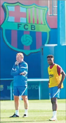  ??  ?? Ronald Koeman y Ansu Fati.