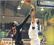  ?? Scott Strazzante / The Chronicle ?? Precious Achiuwa, left, is a recruit that UConn is targeting.