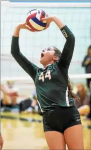  ?? PETE BANNAN - DIGITAL FIRST MEDIA ?? Bishop Shanahan’s Ceandra Ashman (44) sets for a teammate during the Eagles’ 3-0 win over Downingtow­n West in their 1-AAAA semifinal Thursday.