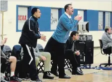  ?? NIAGARA COLLEGE ?? Mike Hurley, light blue sweater, spent 11 seasons as an assistant coach on the Niagara College men's team before becoming interim head coach in 2017-18.