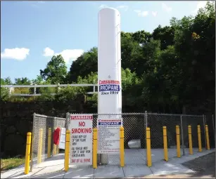  ?? Ernest A. Brown photo ?? A brand new propane tank has been installed at Consumers Propane in Woonsocket.