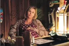  ??  ?? Charlize Theron stars as a beleaguere­d mother — is there any other kind? — in Tully, the latest from Diablo Cody and Jason Reitman.