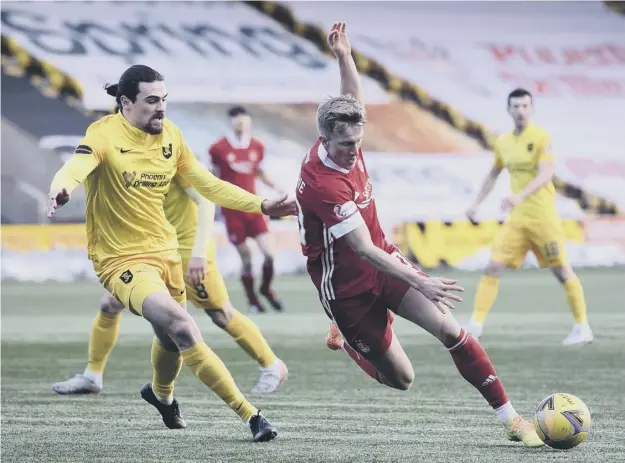  ??  ?? 0 Livingston defender Ciaron Brown, left, moves in to challenge Ross Mccrorie on Saturday. Below inset: Livi boss David Martindale