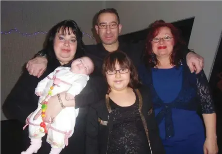  ??  ?? DIANA WITH her family on New Year 2013-14 (from left to right starting from top): Diana; her partner, Liborio; her mother, Bela; her younger daughter, Giuliana; and Susanna.