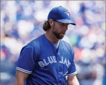  ?? AARON VINCENT ELKAIM, THE CANADIAN PRESS ?? Blue Jays pitcher R.A. Dickey pitched 5 2/3 innings, allowing four hits, including two home runs, five walks and seven runs, six of them earned.