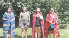  ?? BRIDGES FOR WOMEN SOCIETY ?? From left, Kathy Smith, Lydia Jim (community connector), Jolisa Saunders and Andrea Sam gather after a Bridges For Women program graduation with members of the Tsartlip First Nation in 2020.