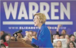  ?? ANDREW HARNIK/AP ?? Sen. Elizabeth Warren speaks to supporters during her caucus night watch party late Monday in Des Moines.