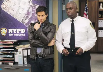  ?? — FOX FILES ?? Andy Samberg, left, and Andre Braugher in Brooklyn Nine-Nine. The show was taken over by NBC after it was cancelled by Fox.