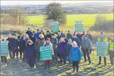  ?? ?? Protesters want the Heathlands scheme scrapped