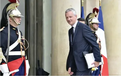  ??  ?? French Economy Minister Bruno Le Maire arrives for a cabinet meeting at the Elysee Palace in Paris on Aug. 30. (AFP)