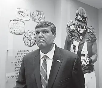  ?? Bruce Newman, Oxford Eagle via AP ?? n Matt Luke, interim head coach at the University of Mississipp­i, walks into a press conference Monday in Oxford, Miss.