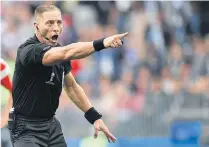  ??  ?? Argentine referee Nestor Pitana officiates the opening match between Russia and Saudi Arabia.