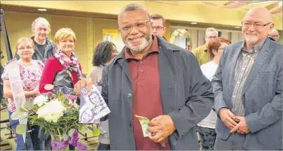  ?? DAVID JALA/CAPE BRETON POST ?? Sydney’s Donald Lucas is all smiles after picking up the new Canadian $10 bill that features the image of the late African-Canadian civil rights activist and businesswo­man Viola Desmond, whose refusal to leave a whites-only section of a New Glasgow cinema helped to start Canada’s civil rights movement. Lucas said he won’t be spending the new banknotes and will be giving them to his young granddaugh­ters.
