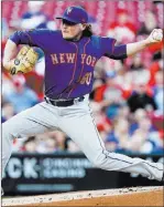  ?? John Bazemore ?? The Associated Press P.J. Conlon works for the Mets in the first inning of the second game of a doublehead­er against the Atlanta Braves on May 28 in Atlanta.