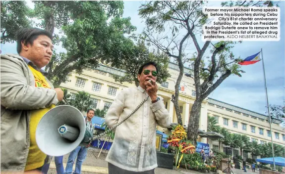  ?? ALDO NELBERT BANAYNAL ?? Former mayor Michael Rama speaks before his supporters during Cebu
City's 81st charter anniversar­y Saturday. He called on President Rodrigo Duterte anew to remove him in the President's list of alleged drug protectors.