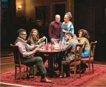  ?? MICHAEL BROSILOW ?? Harry Lennix, ensemble members Alana Arenas and Glenn Davis, Tamara Tunie, Ayanna Bria Bakari and ensemble member Jon Michael Hill in Steppenwol­f Theatre Company’s world premiere of “Purpose” by Branden Jacobs-Jenkins.