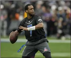  ?? JOHN LOCHER — THE ASSOCIATED PRESS ?? NFC quarterbac­k Geno Smith of the Seattle Seahawks throws a pass during the flag football event at the NFL Pro Bowl against the AFC in February in Las Vegas.