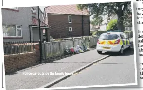  ??  ?? Police car outside the family home