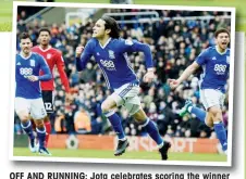  ??  ?? OFF AND RUNNING: Jota celebrates scoring the winner