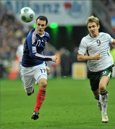  ??  ?? Kevin Doyle in a race for the ball with Sebastien Squillaci of France in the FIFA 2010 World Cup qualifying play-off second leg in Paris on November 18, 2009. It was the closest the star striker ever got to matching the feats of his childhood heroes from 1990.