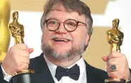  ?? REUTERS ?? Guillermo del Toro with the best director award and the best picture award for The Shape of Water at the 90th Academy Awards in Los Angeles.