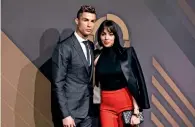  ?? AP ?? Cristiano Ronaldo and his girlfriend Georgina Rodriguez arrive for the Portuguese soccer federation awards on Monday. —
