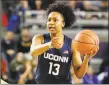  ?? Karl B DeBlaker / Associated Press ?? UConn’s Christyn Williams runs a play against East Carolina during a game in January.