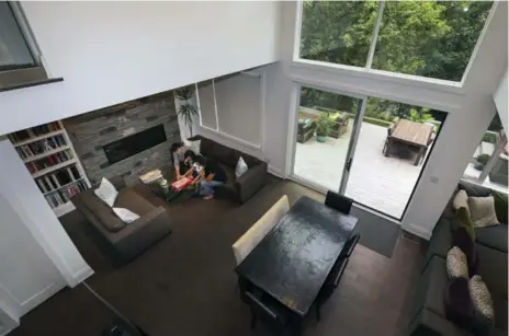  ?? ANDREW FRANCIS WALLACE/TORONTO STAR ?? The couple picked the biggest sliding glass door they could get their hands on so the backyard would feel like an extension of their living space.