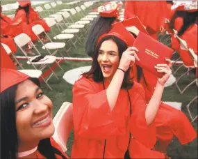  ?? Christian Abraham / Hearst Connecticu­t Media ?? Central High School's Class of 2018 graduation exercises in Bridgeport in June.