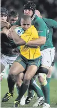  ??  ?? Flashback: Stephen Ferris gets to grips with Will Genia in 2011