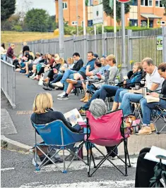  ??  ?? Some parents queued through the night in Cardiff to enrol children in the breakfast club