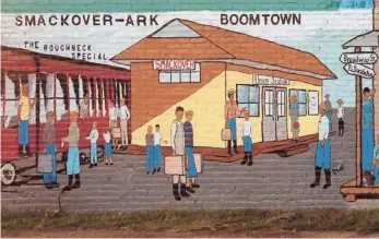  ?? (Courtesy of Max Taylor/Special to the News-Times) ?? A mural depicting Smackover in 1923 has been restored at Kennedy Park in downtown Smackover.