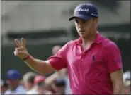  ?? JOHN BAZEMORE — ASSOCIATED PRESS ?? Justin Thomas celebrates after a birdie on 13th hole en route to winning PGA Championsh­ip on Sunday in Charlotte, N.C.