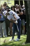  ?? MARCO UGARTE — ASSOCIATED PRESS ?? Dustin Johnson, bounces a ball off a tree during the first round of the Mexico Championsh­ip at the Chapultepe­c Golf Club in Mexico City on Thursday.