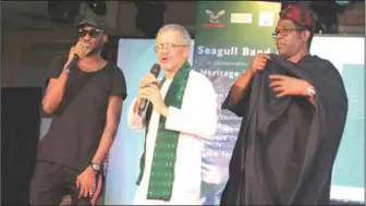  ??  ?? L-R: Hip-hop artiste, Tu Face Idibia; Environmen­talist Majekodunm­i; and veteran actor, Patrick Doyle, at the Ita Giwa climate change carnival in Lagos…recently