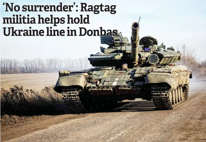  ?? — AFP photos ?? A Ukrainian tank runs on a road near Bakhmut, in the Donetsk region amid the Russian invasion of Ukraine.